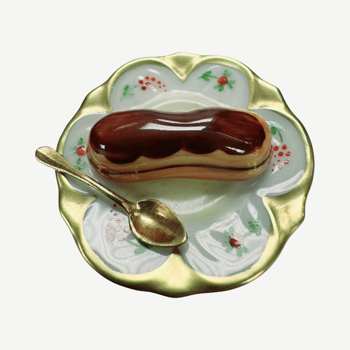 Eclair on Plate Limoges Box Gift, a hand-painted Limoges porcelain gift