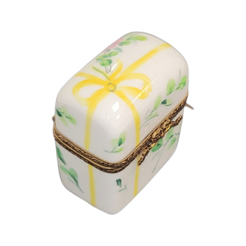 Every brushstroke by hand on the 2 Perfume Yellow Bow Tall Flowers Limoges box from France