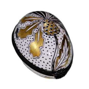 Boldly Painted Black Gold Egg for Elegance, a hand-painted Limoges porcelain gift