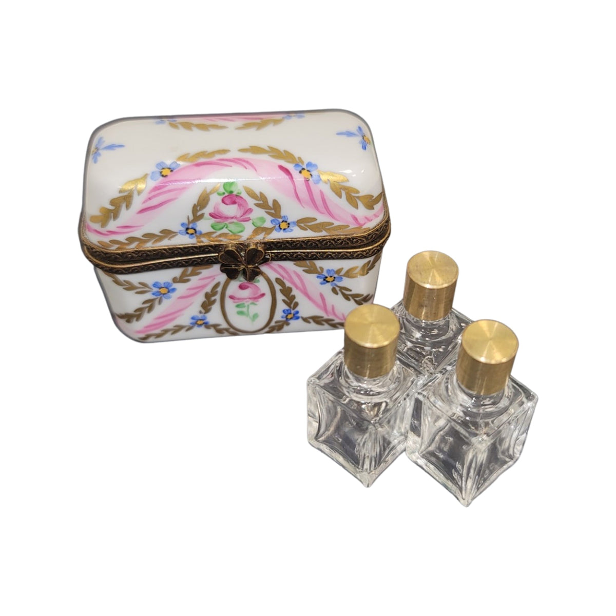 Fine French craftsmanship on the 3 Perfume Pink Gold Flowers Limoges box, painted by hand
