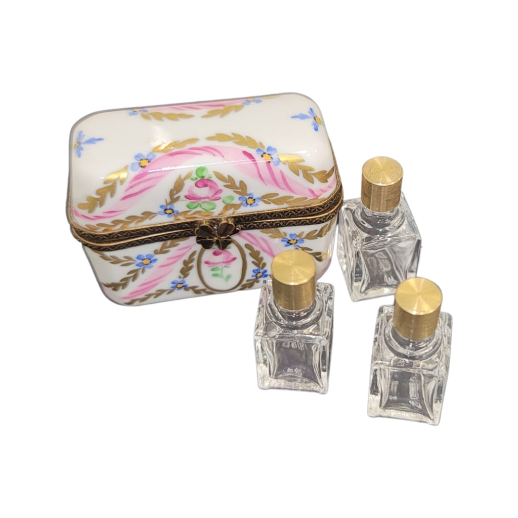 Limoges Boutique presents the 3 Perfume Pink Gold Flowers, a genuine Limoges box painted by hand in France