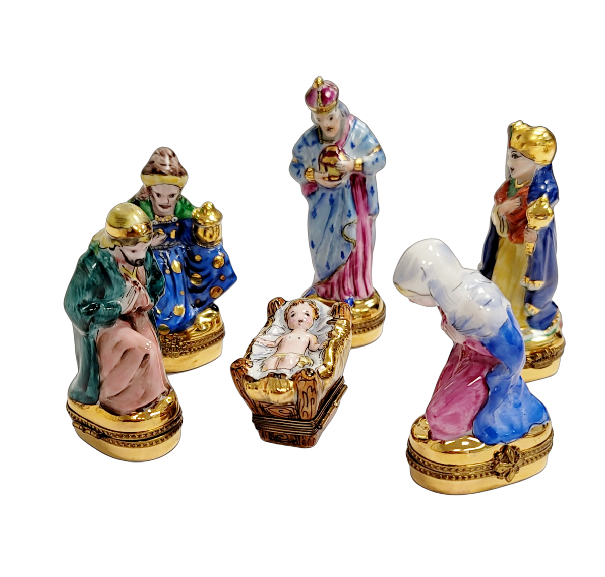 Limoges Boutique presents the 6 Piece Nativity Gold Bottom Set, a genuine Limoges box painted by hand in France