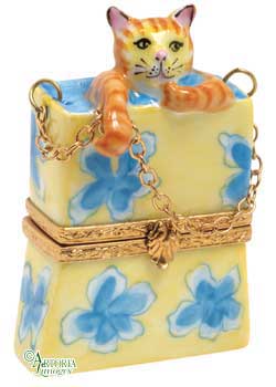 Cat in Shopping Bag Limoges box, an heirloom-quality piece for collectors