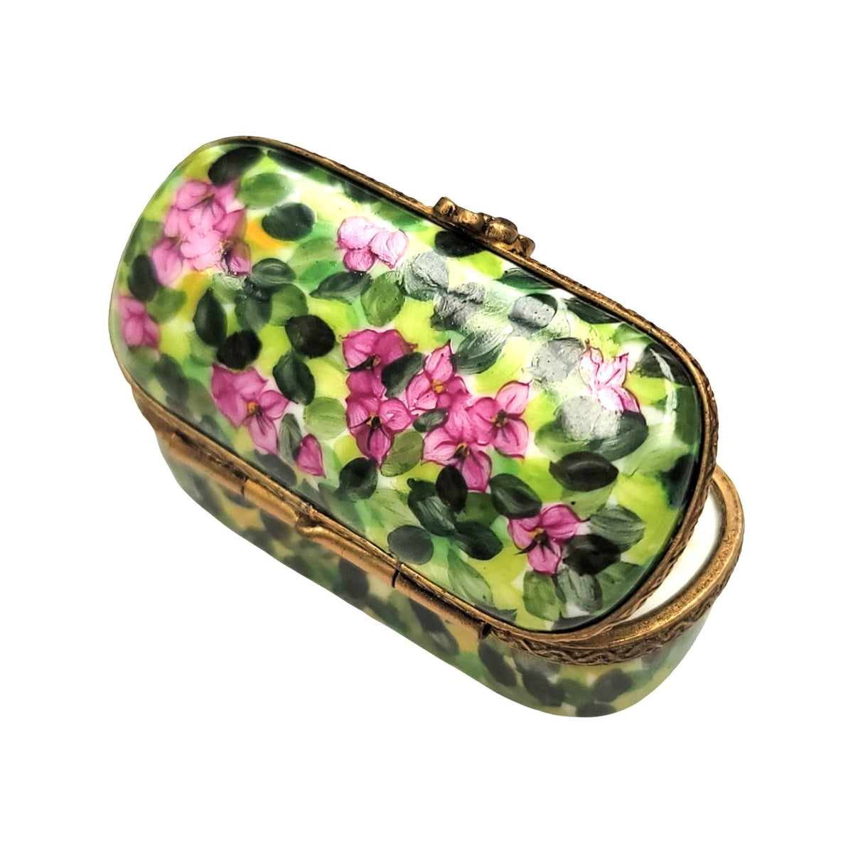 Every brushstroke by hand on the Antique Oval Pin with Leaves Limoges box from France