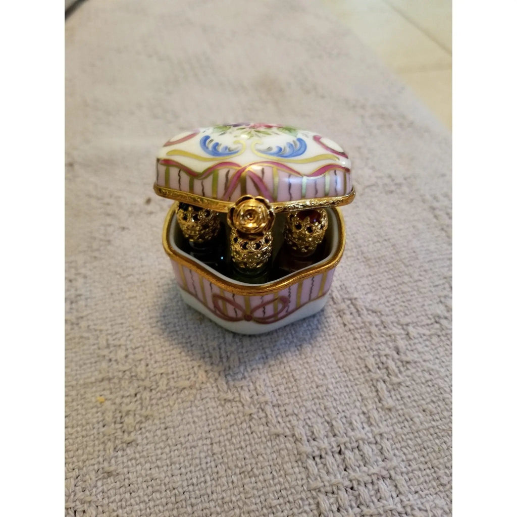 Painted details on the Odd Shape 4 Perfume Bottles Limoges box, French art in miniature