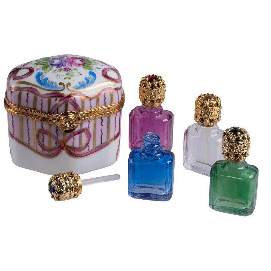 Every brushstroke by hand on the Odd Shape 4 Perfume Bottles Limoges box from France