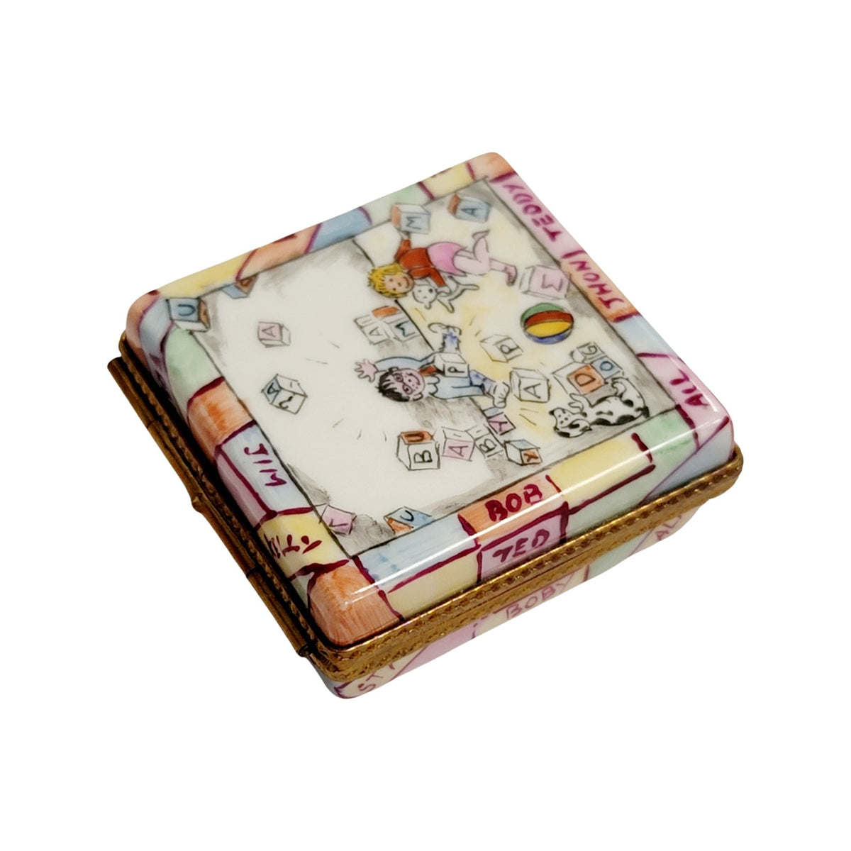 Fine French craftsmanship on the Baby Blocks Baby Limoges box, painted by hand