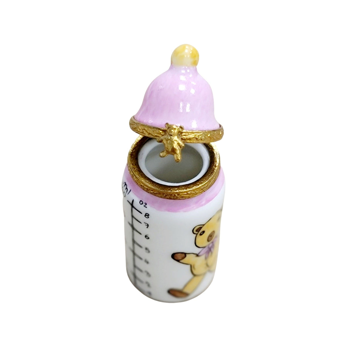Every brushstroke by hand on the Baby Bottle Pink Limoges box from France