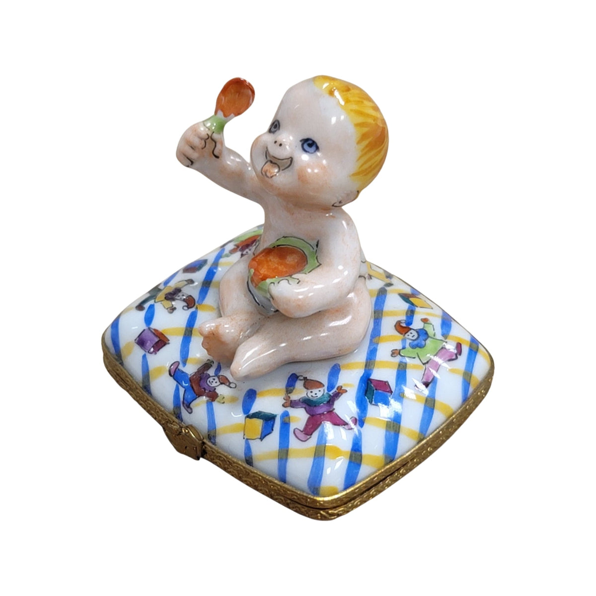 Collectible Baby Eating on Pillow Limoges box with artisan brushwork