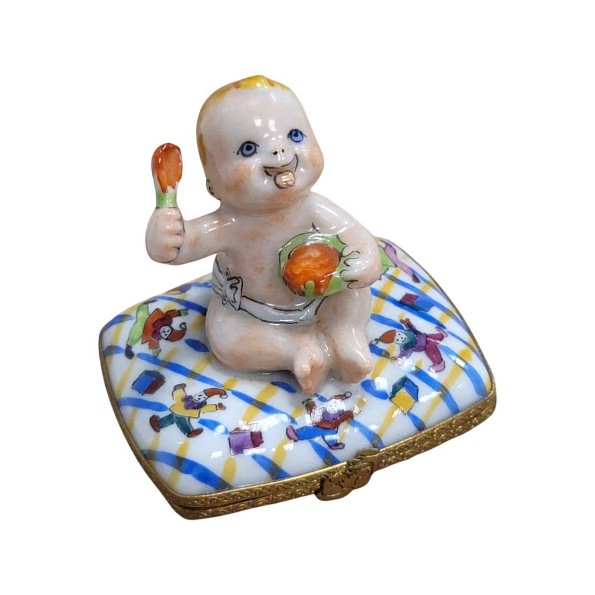 The Baby Eating on Pillow, a Limoges keepsake with true French charm