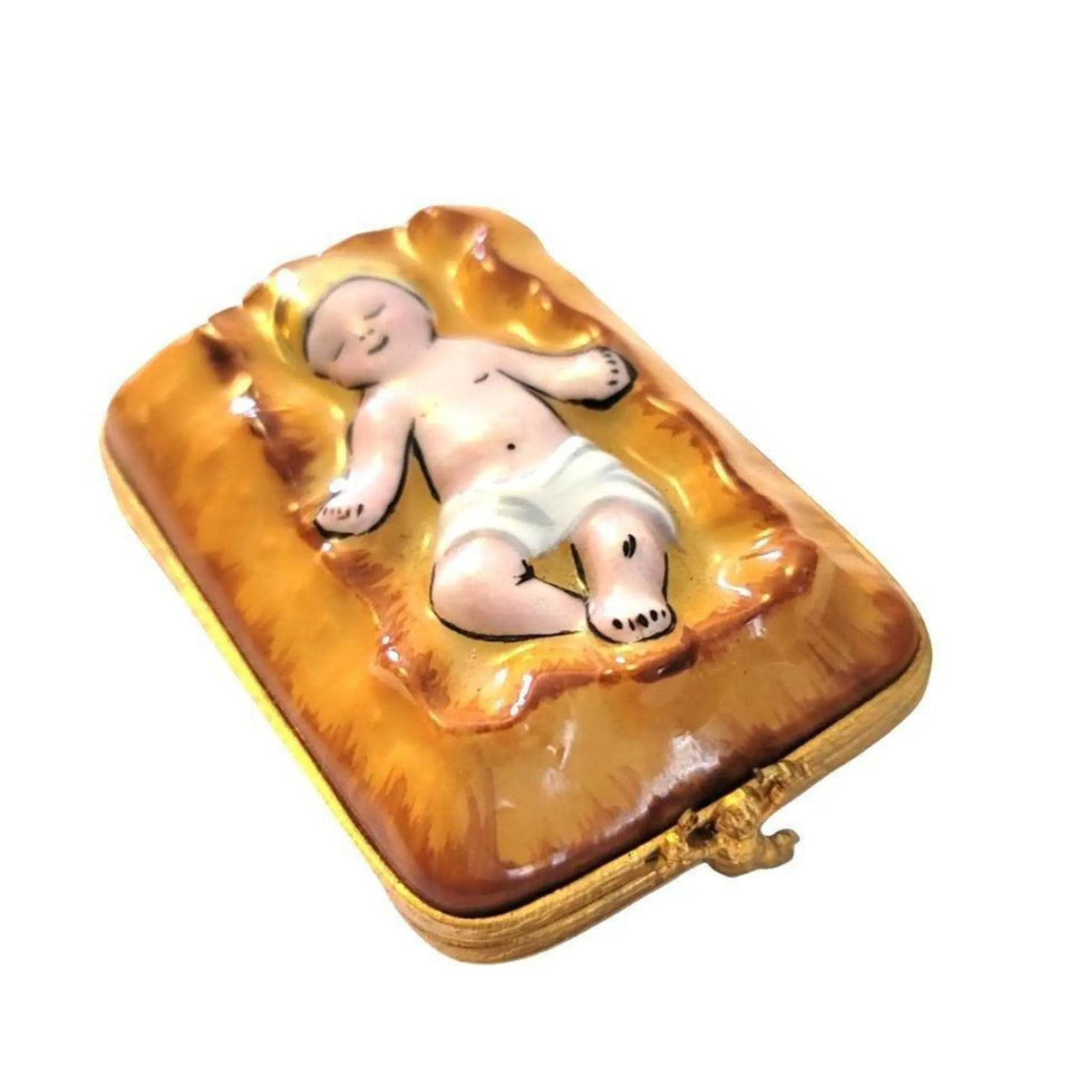 The Baby Jesus on Straw for Manger Scene, a Limoges keepsake with true French charm