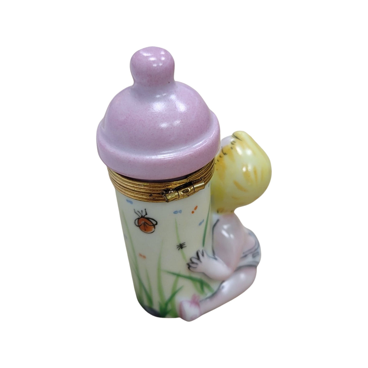 The Baby with Pink Bottle, a Limoges keepsake with true French charm