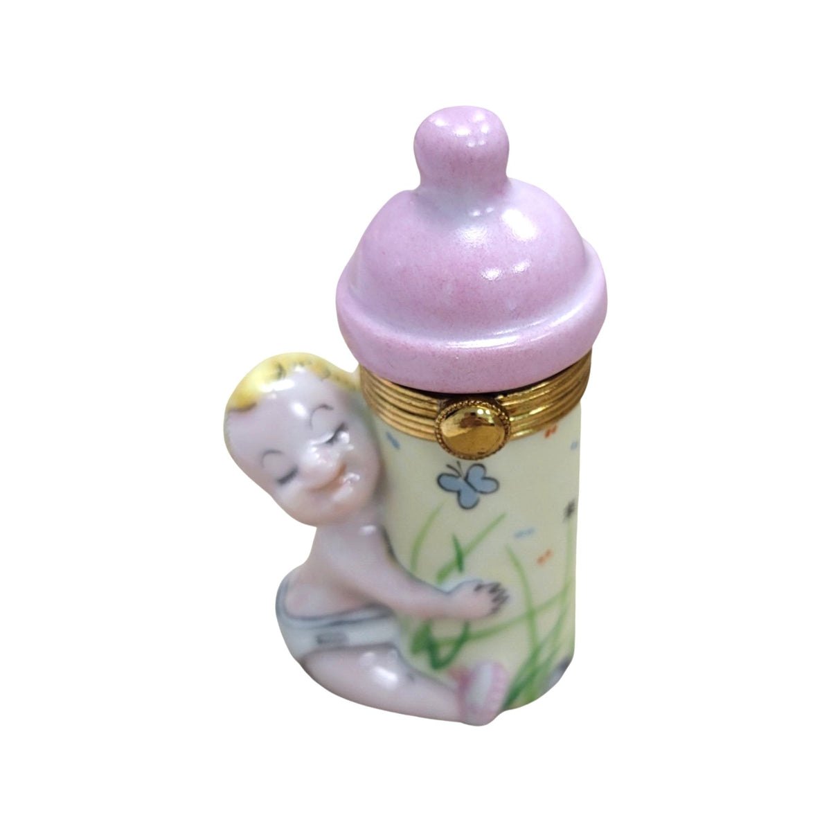Limoges Boutique presents the Baby with Pink Bottle, a genuine Limoges box painted by hand in France