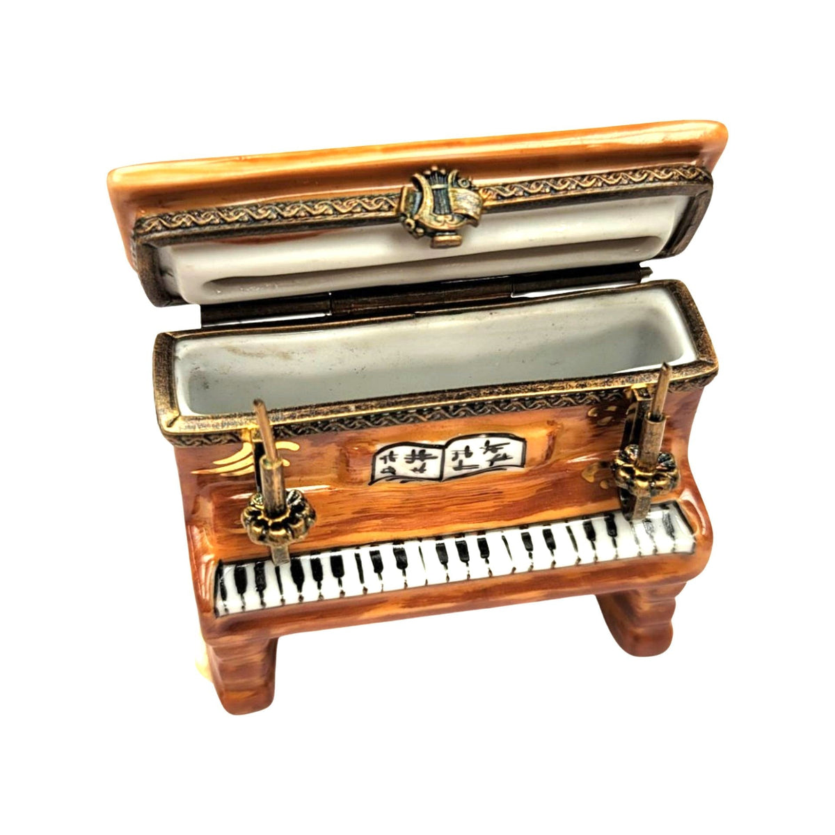 Fine French craftsmanship on the Piano Ballerina Candles Limoges porcelain, painted by hand