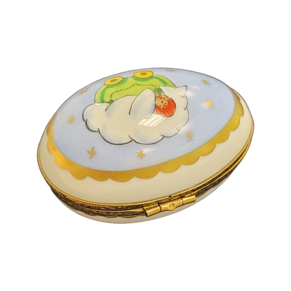 Painted details on the Blue Baby Egg Limoges box, French art in miniature