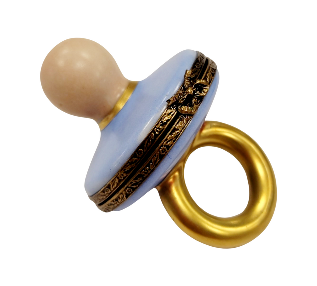 Blue Porcelain Pacifier Figurine for Baby Limoges Box, a hand-painted Limoges porcelain gift
