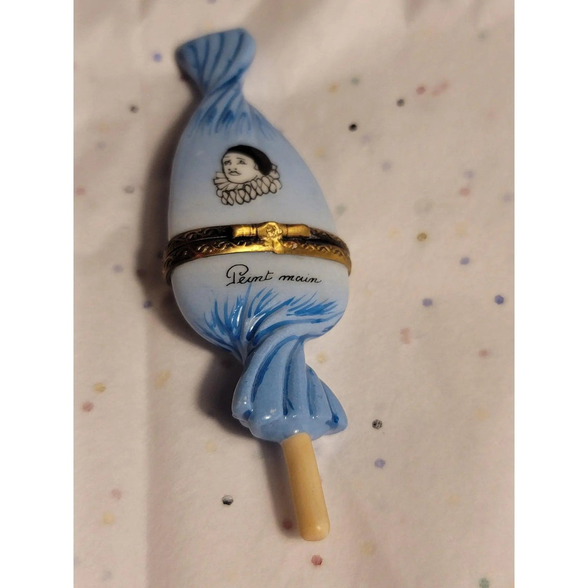 Artisan-painted Sweet Candy Lollipop Blue Clown Wrapping Limoges box from France, a cherished collectible
