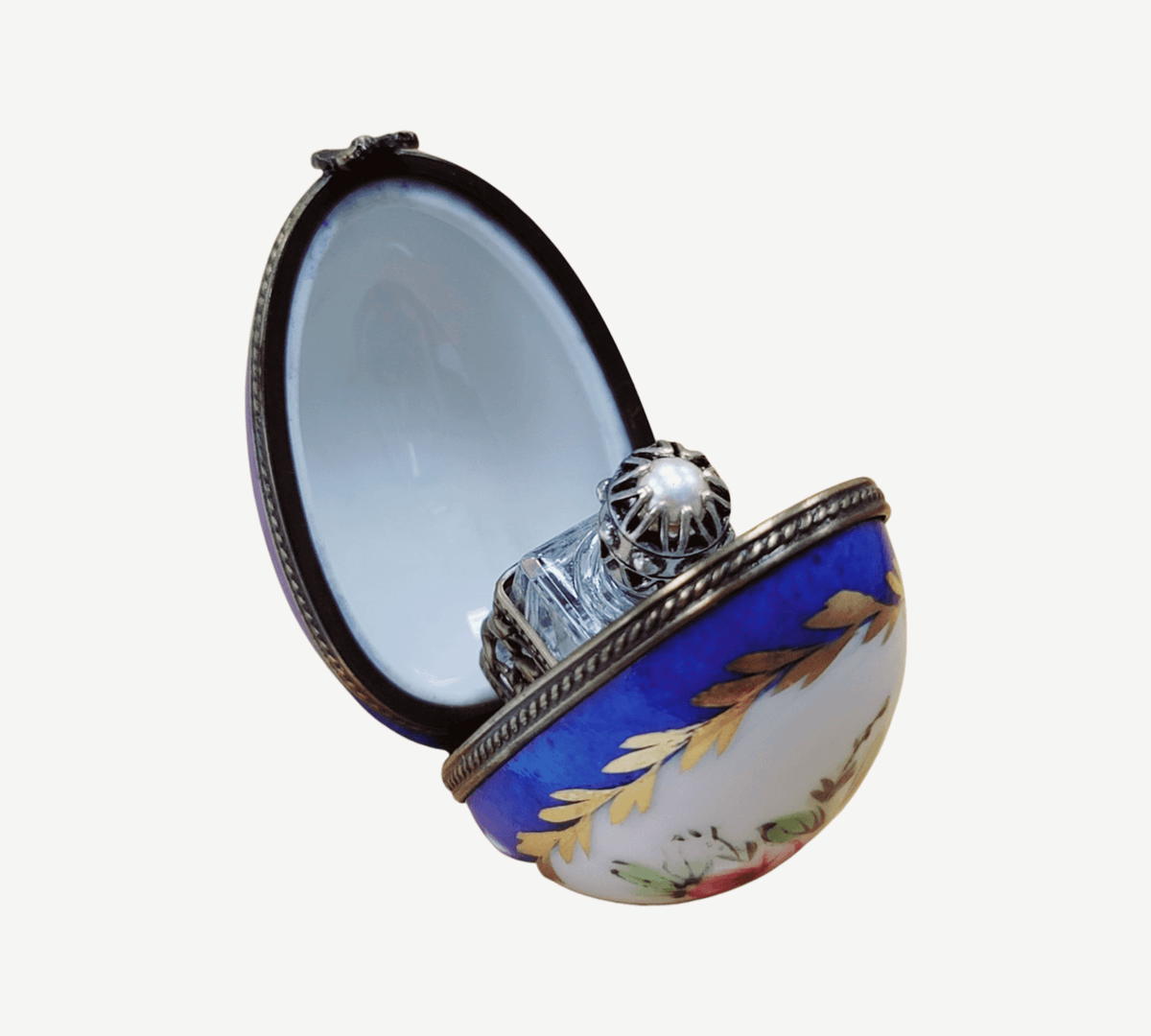 Artisan-painted Blue Egg Vertical Perfume Limoges box from France, a cherished collectible