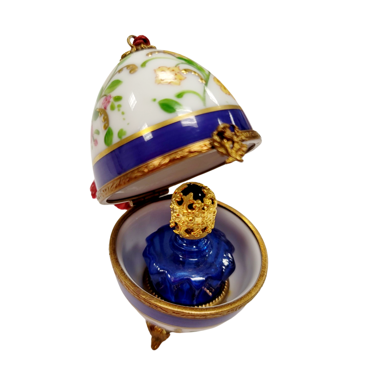 Limoges Boutique presents the Blue Flowers Egg with Perfume, a genuine Limoges box painted by hand in France