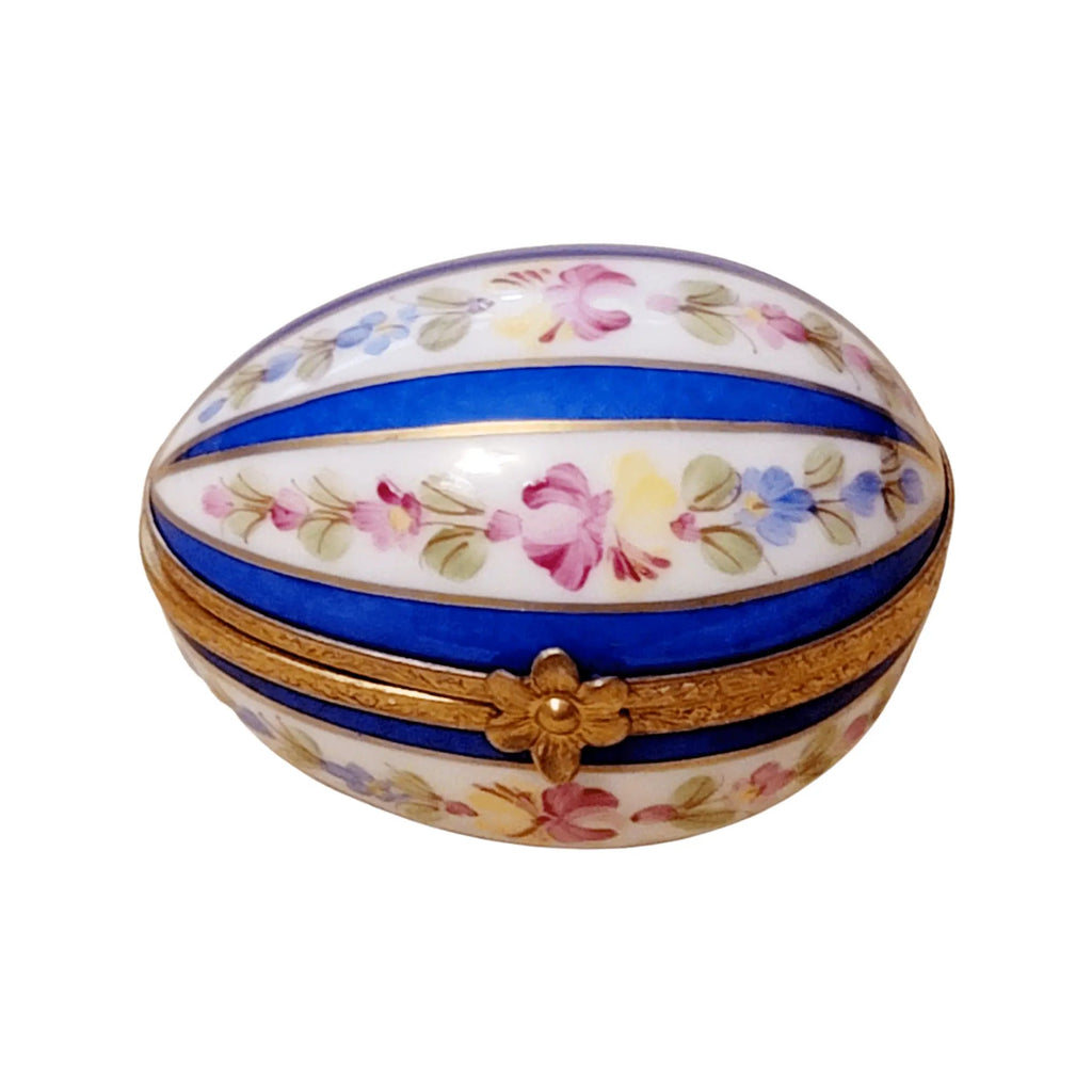 Limoges Boutique presents the Blue Striped Egg, a genuine Limoges box painted by hand in France