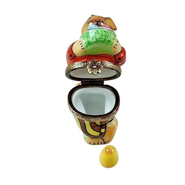 Every brushstroke by hand on the Brown Easter Rabbit with Removable Egg Limoges box from France