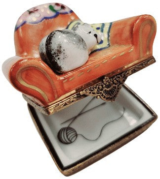 Fine French craftsmanship on the Cat in Arm Chair Limoges box, painted by hand