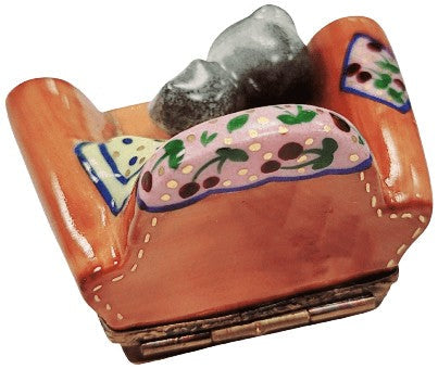 Cat in Arm Chair Limoges box, an heirloom-quality piece for collectors