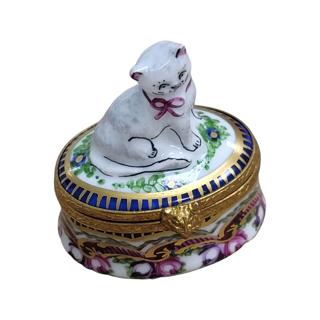 The painter's artistry shows on this Cat Sevre Roses Base Cat Limoges box