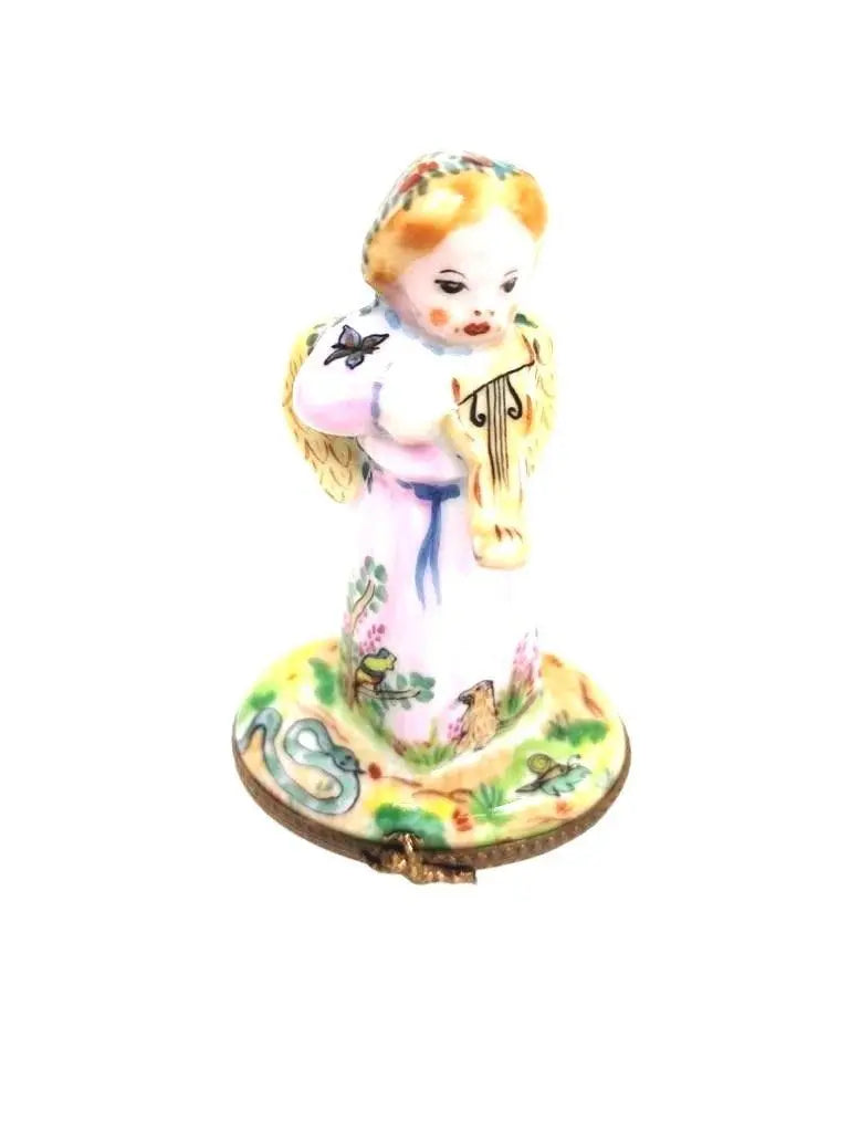 Fine French craftsmanship on the Angel with Violin Garden of Eden Limoges box, painted by hand