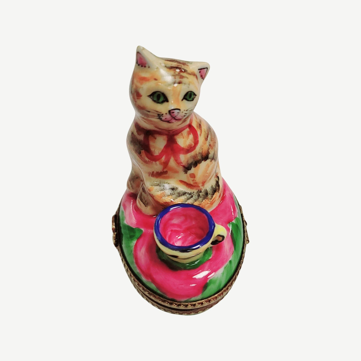 Every brushstroke by hand on the Cat with Pink Cup Limoges box from France