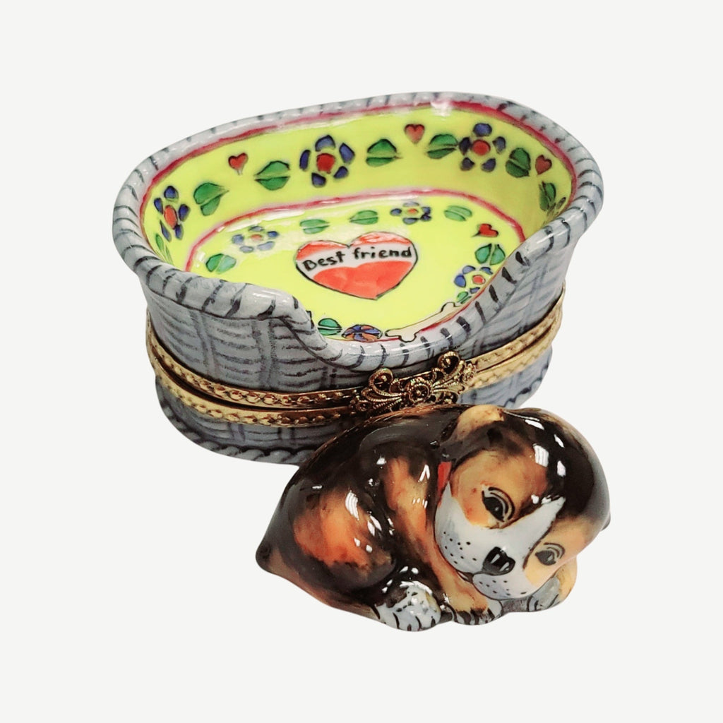 Every brushstroke by hand on the Dog in Basket Limoges box from France