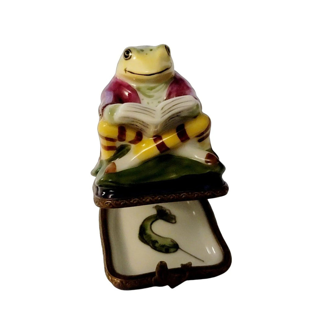 Every brushstroke by hand on the Frog Reading on Chair Limoges box from France