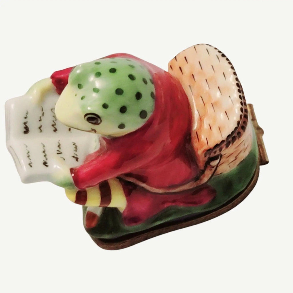 Frog Reading on Chair Limoges box painted by hand in Limoges, France, a gift to treasure