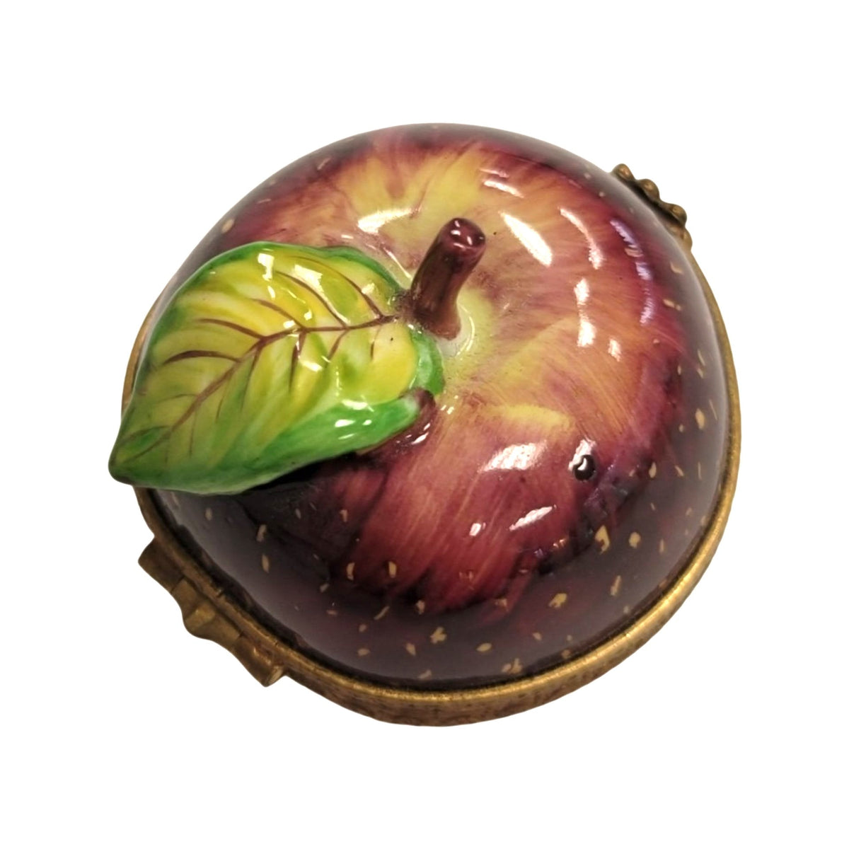 Limoges Boutique presents the Red Apple, a genuine Limoges box painted by hand in France