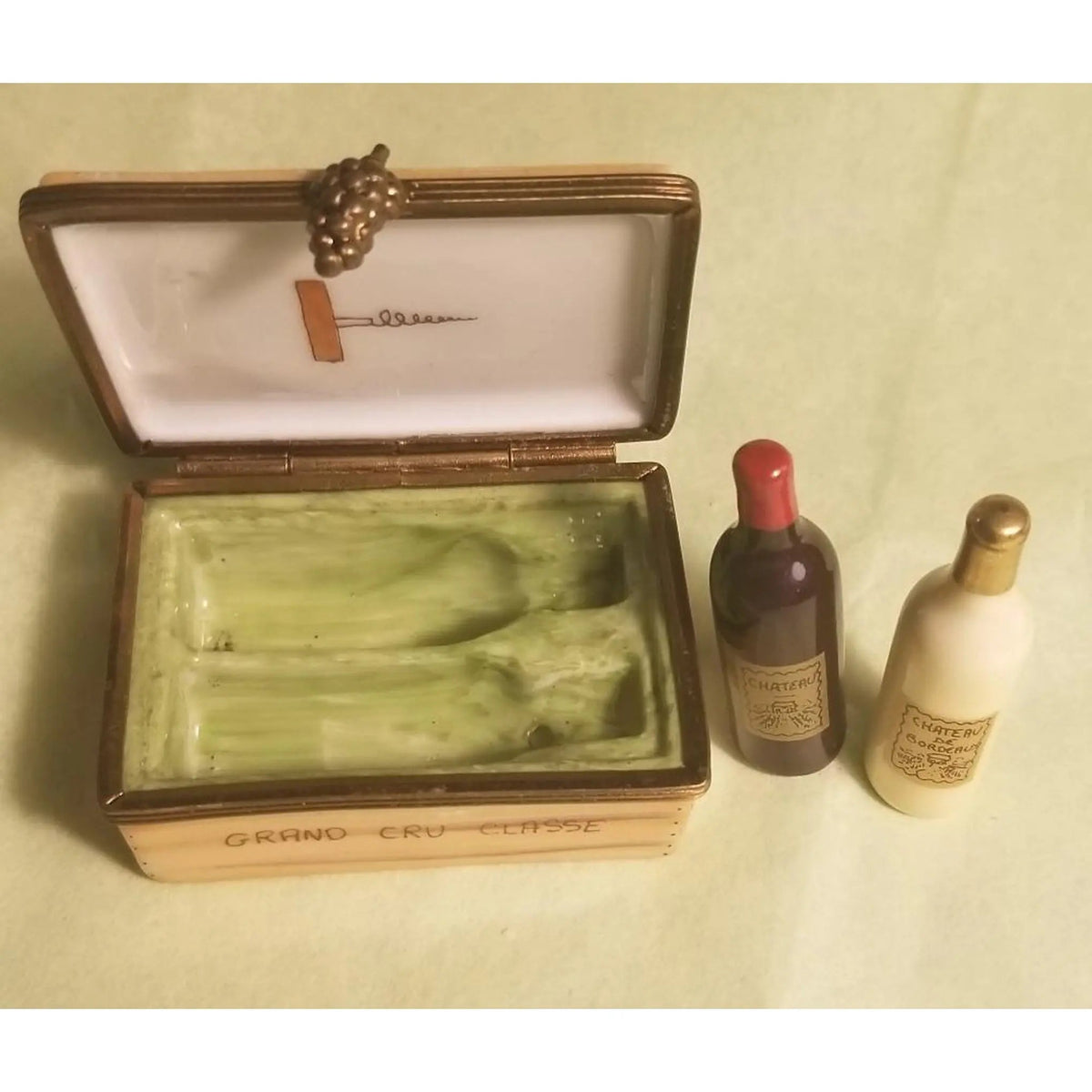 Fine French craftsmanship on the Chateau Wine Crate Taster Set Bottles Limoges box, painted by hand