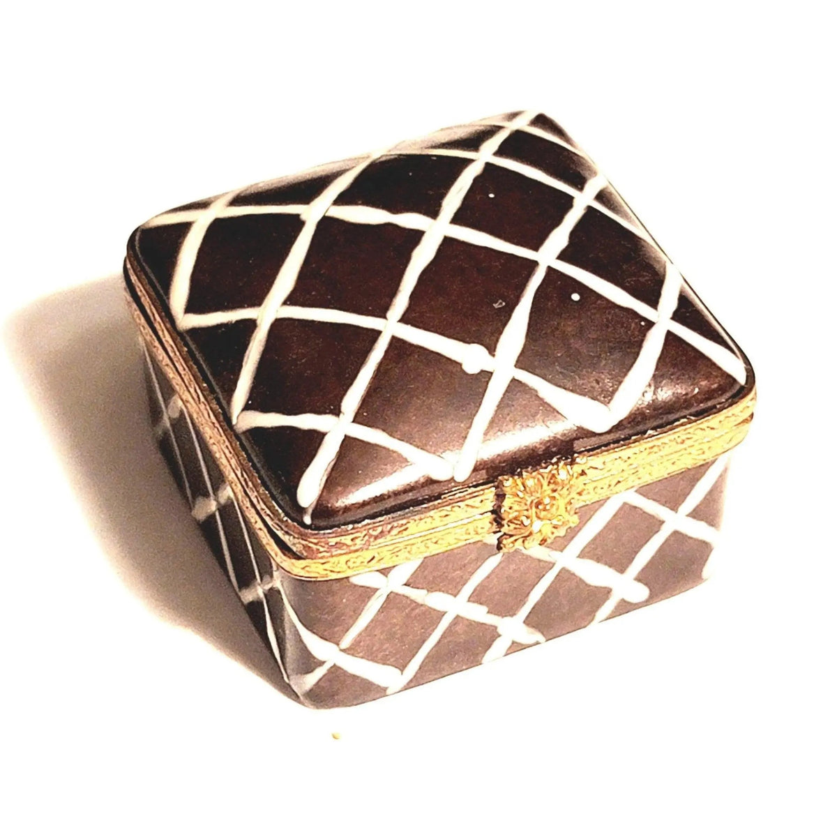 Limoges Boutique presents the Chocolate Icing Cake 2 Vanilla Criss Cross, a genuine Limoges box painted by hand in France