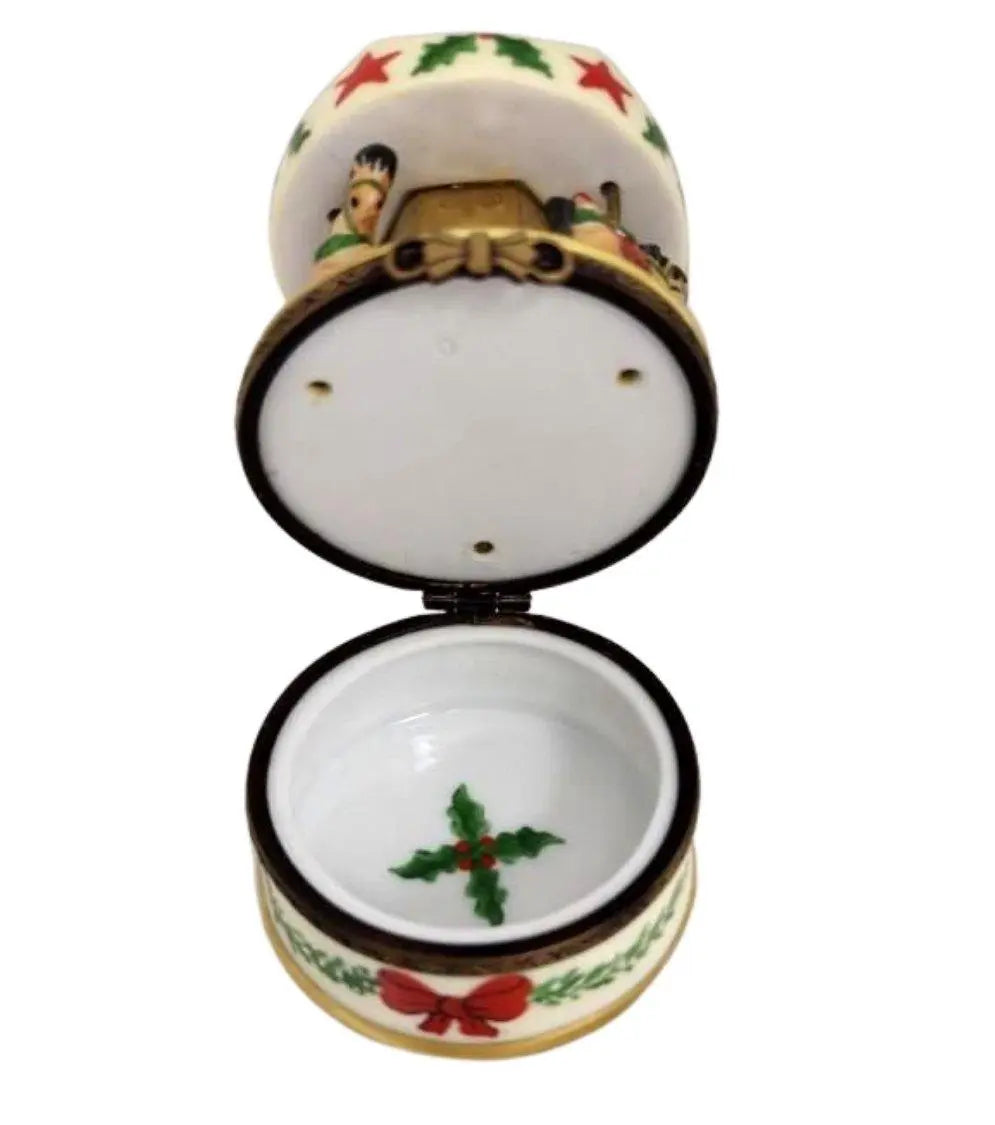 The painter's artistry shows on this Christmas MerryGoRound Carousel Limoges box