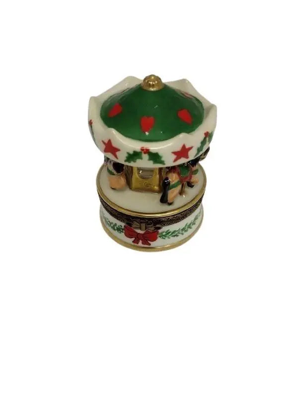 Every brushstroke by hand on the Christmas MerryGoRound Carousel Limoges box from France