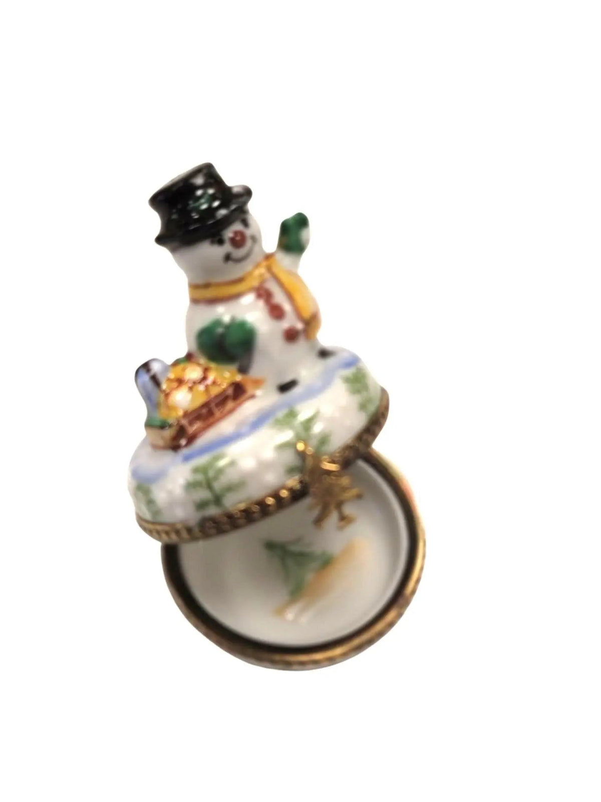 The painter's artistry shows on this Christmas Snowman Waving Limoges box