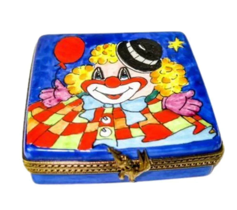 Limoges Boutique presents the Circus Clown with Balloon on Flat, a genuine Limoges box painted by hand in France