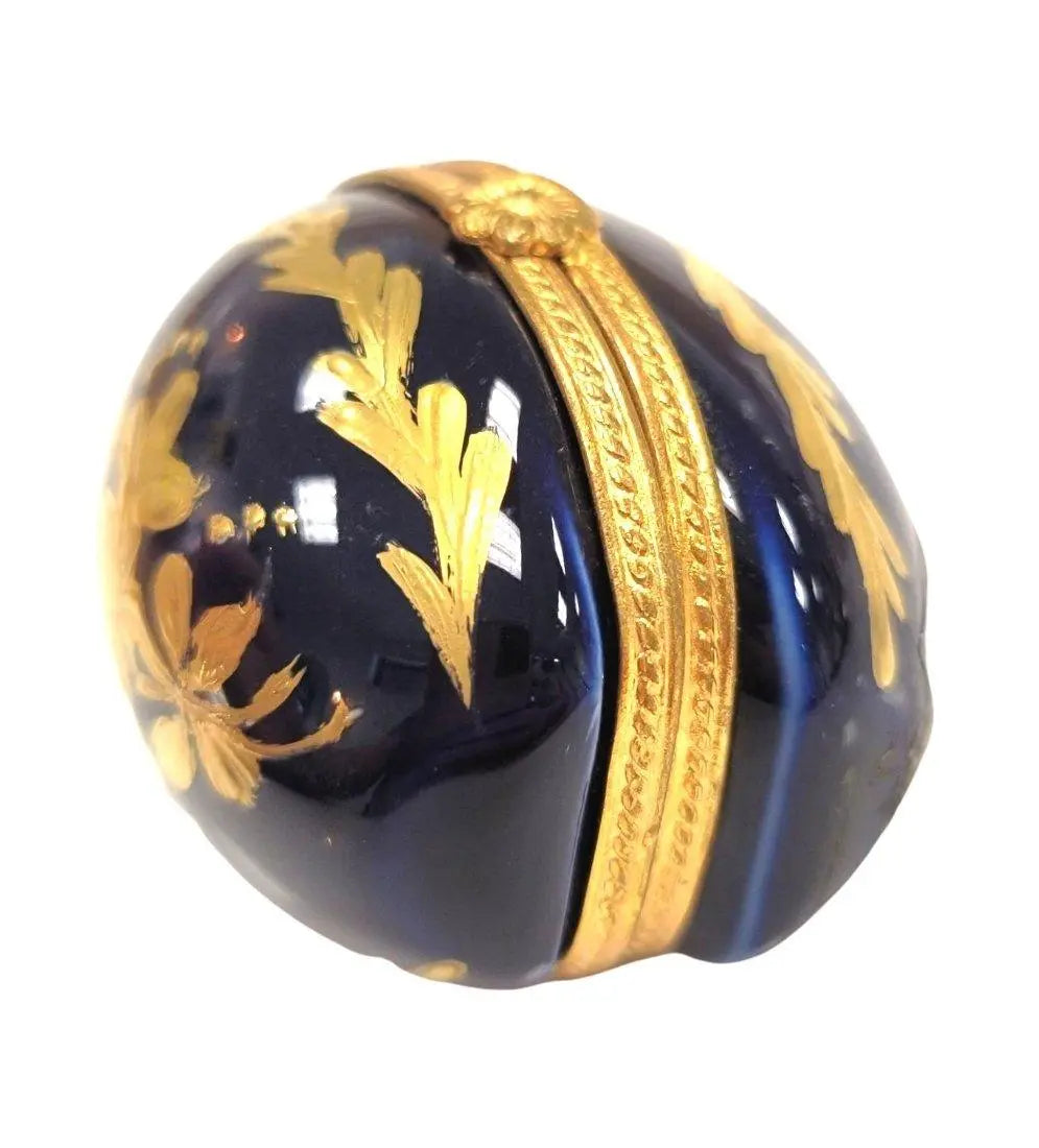 Fine art lovers will admire this Cobalt Blue Gold Egg Oval Picture Frame Vert Limoges box