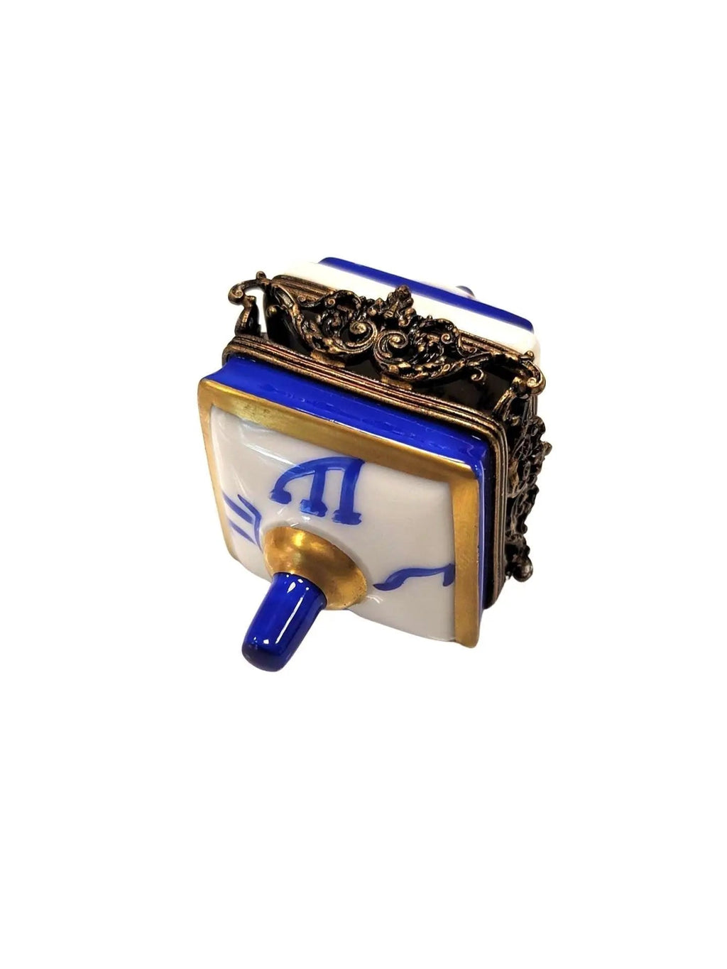 Every brushstroke by hand on the Brass White Dreidel Limoges box from France