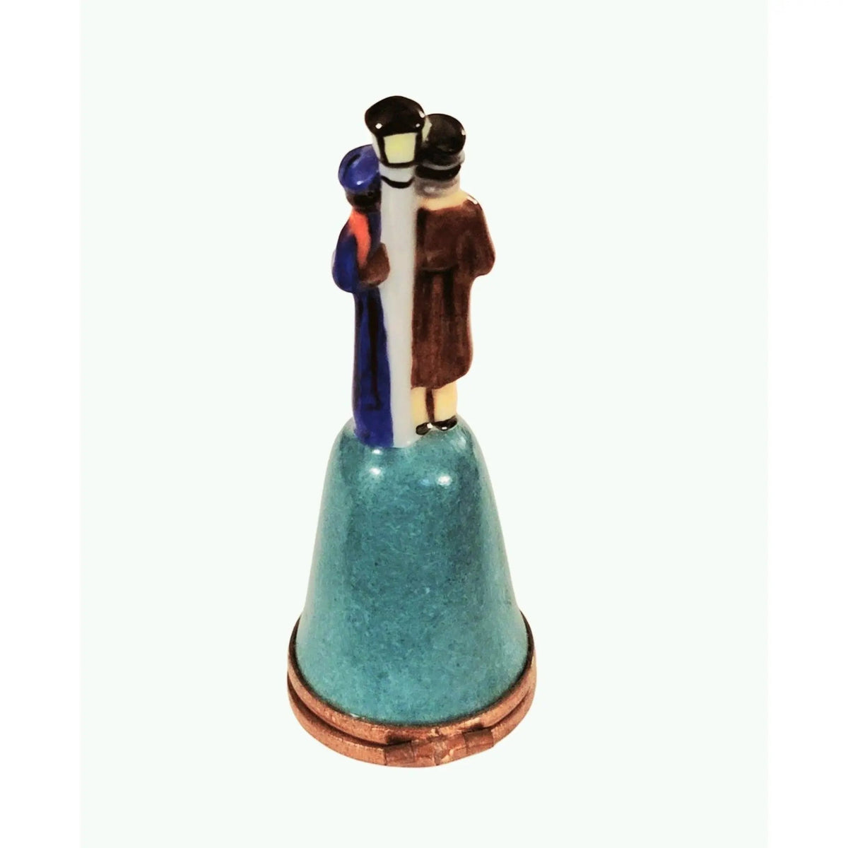 Every brushstroke by hand on the Dickens Christmas Carolers on Bell Beside Lamp Post Limoges porcelain from France