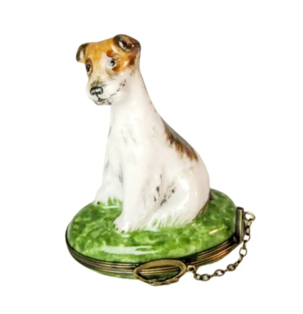 Limoges Boutique presents the Dog on Lawn, a genuine Limoges box painted by hand in France