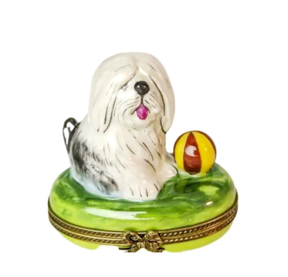 Limoges Boutique presents the Dog with Ball, a genuine Limoges box painted by hand in France