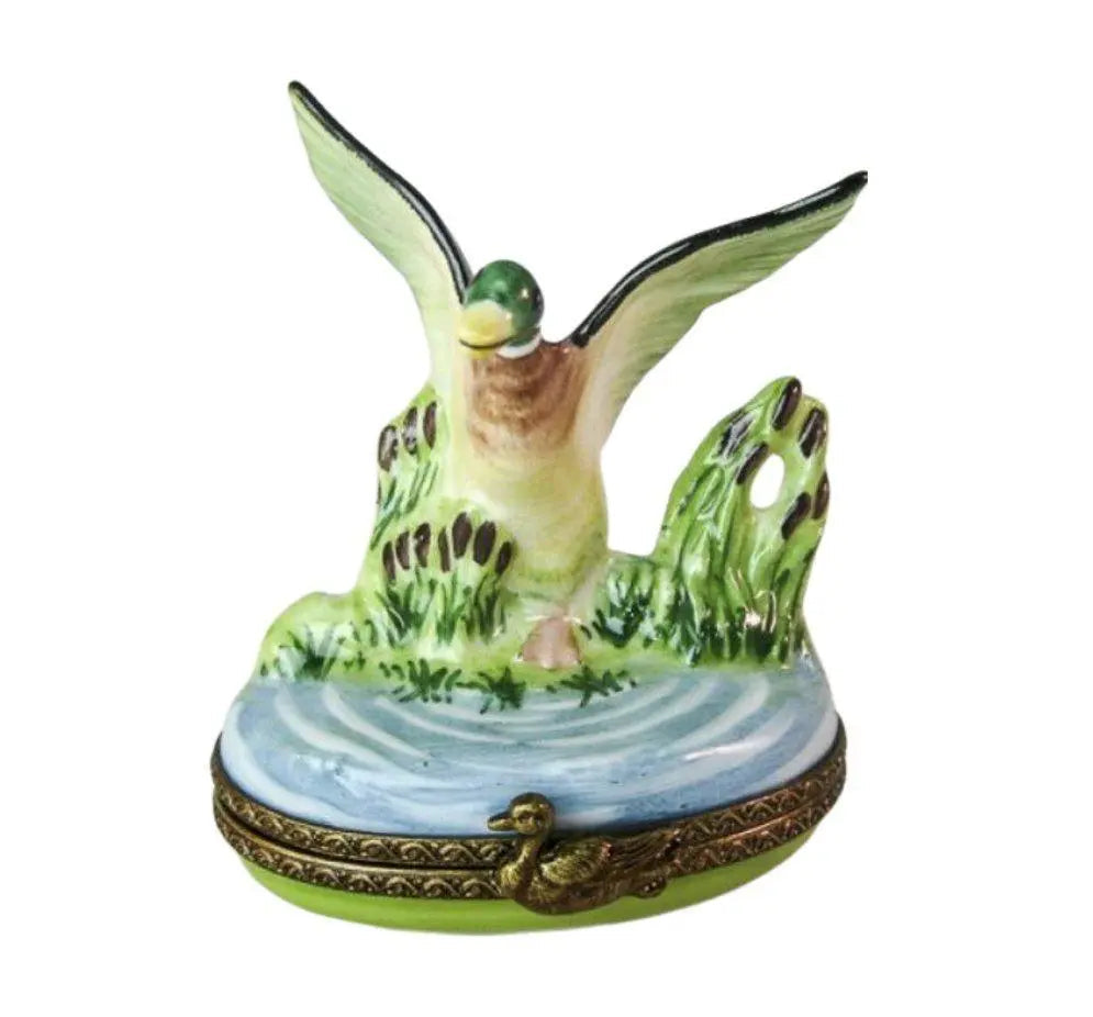 Limoges Boutique presents the Duck in Flight, a genuine Limoges box painted by hand in France