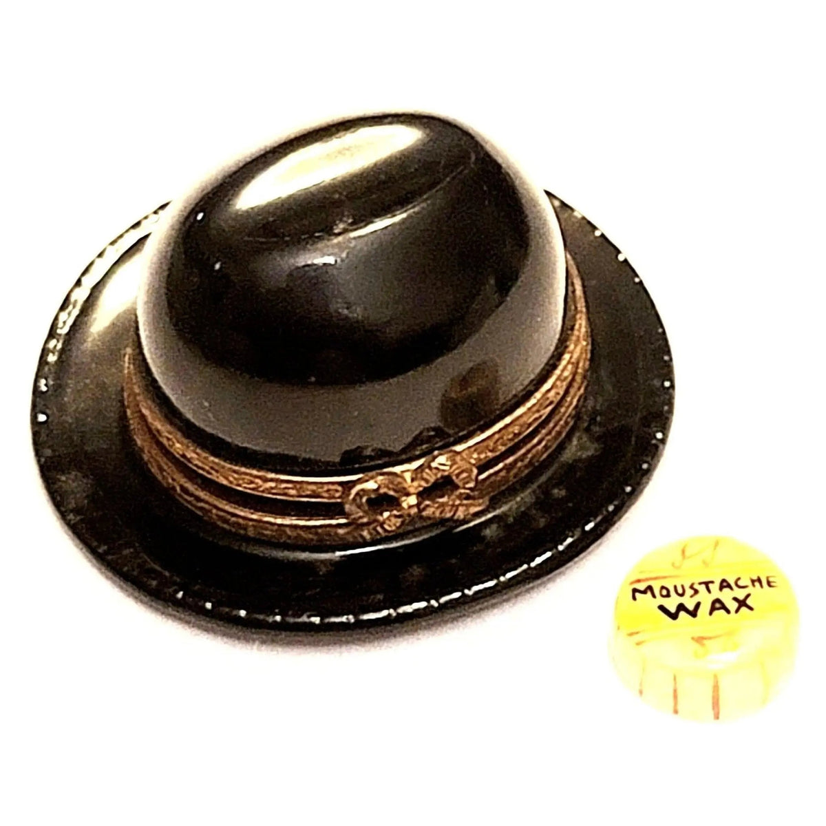 Limoges Boutique presents the Playbill Hat Cap with Mustache Wax Black, a genuine Limoges box painted by hand in France