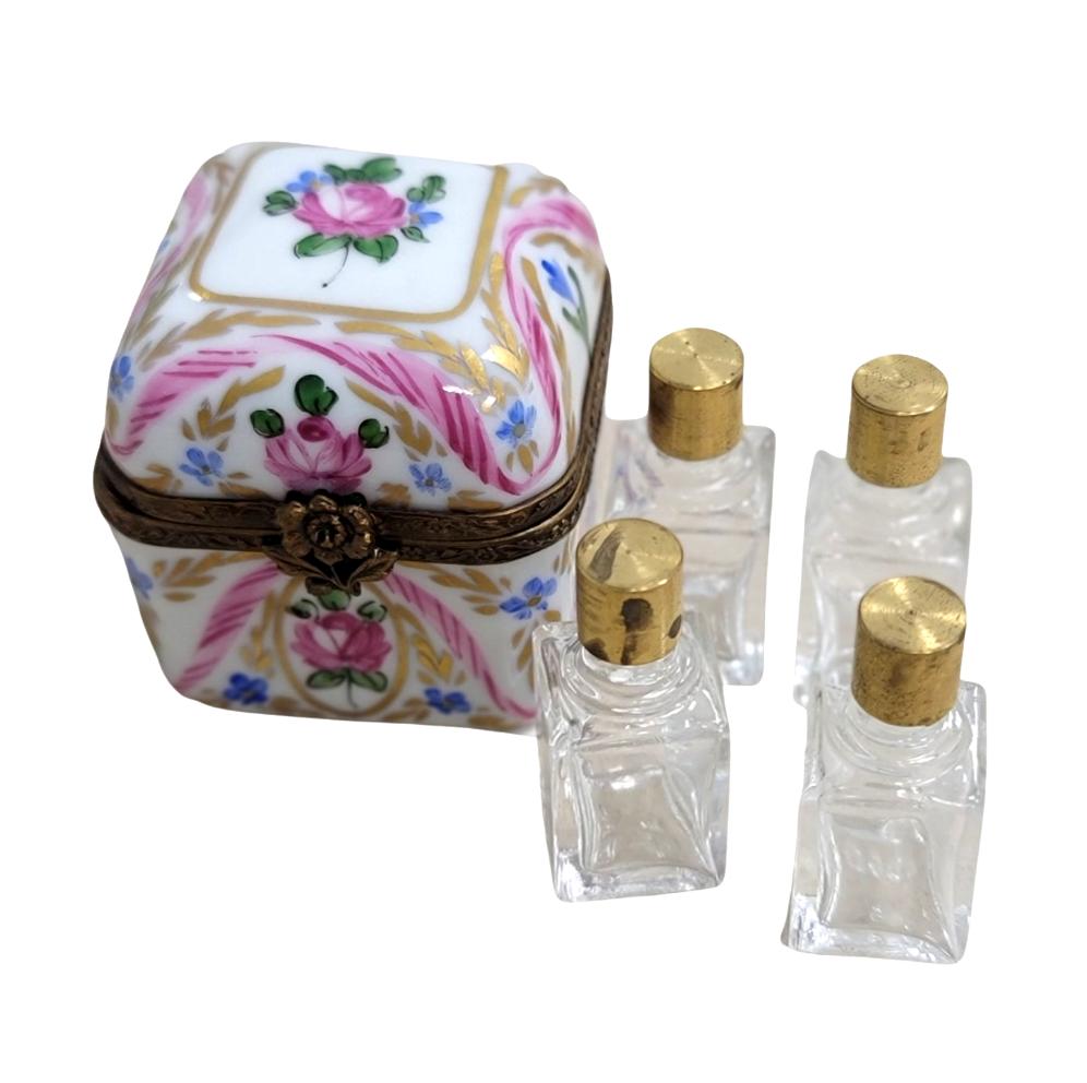 Limoges Boutique presents the 4 perfume pink roses in square, a genuine Limoges box painted by hand in France