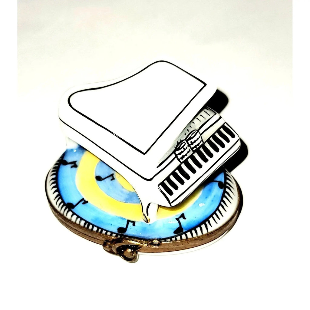 Limoges Boutique presents the White Keys Piano, a genuine Limoges box painted by hand in France
