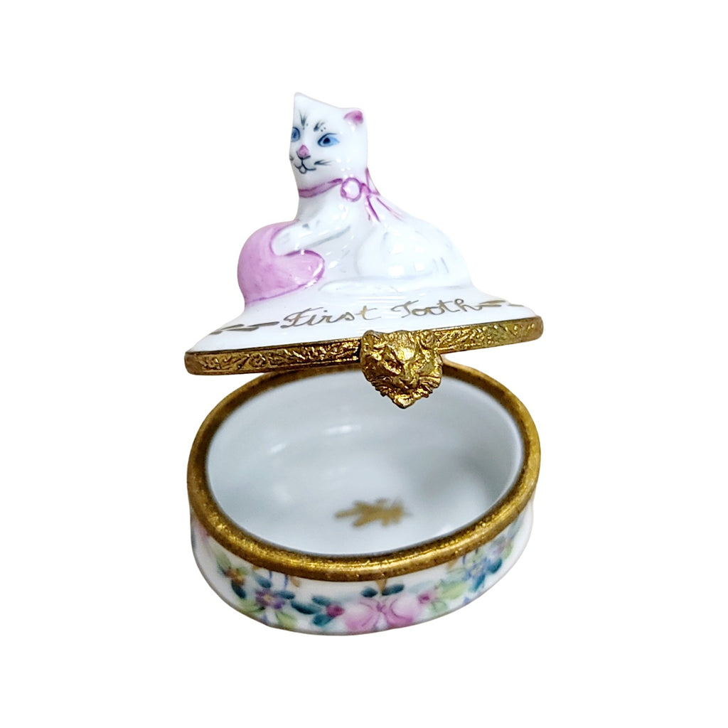 Every brushstroke by hand on the First Tooth Baby Cat Limoges box from France